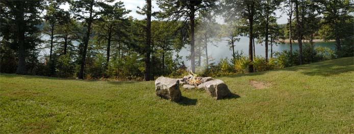 Firepit overlooking lake at Main House